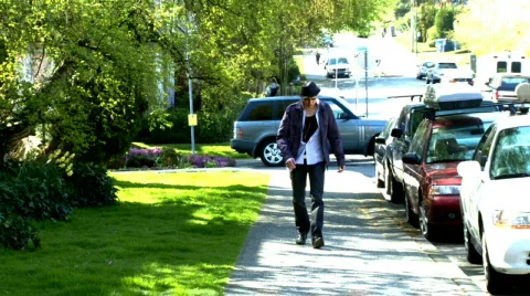 Sad man walking outside Stock Footage 496505