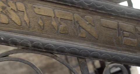 A sad man walks through the old Jewish cemetery in Prague Stock Footage 139499328