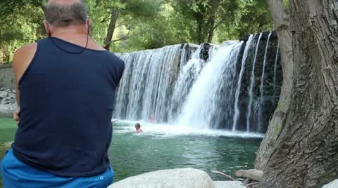 Sad man at waterfall Stock-Footage 11887102