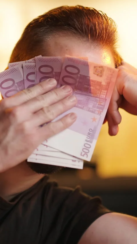Sad man wipe tears with stack of euro money sarcastic meme Stock Footage 324119101