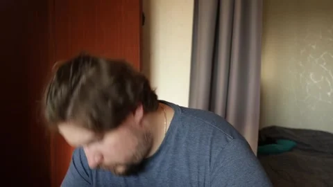 Sad man working on laptop, dealing with an error while studying indoors, ex.. Stock Footage 300668652