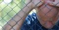 Sad Men Beside Metal Fence Border Protect Wall Suffering Depressed Stressed 4k or 4k+ Resolution