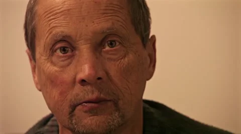 Sad men is looking into the camera Stock Footage 57358309