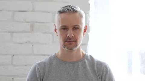 Sad Middle Aged Man Feeling Upset, tears in Eyes Video stock 75299099