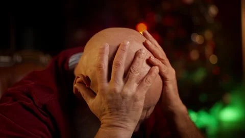 Sad middle-aged man struggles with depression while spending Christmas alone Stock Footage 342520493