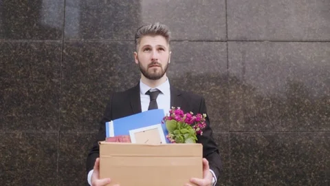 Sad Office Worker Holding Box After Layoff and Job Dismissal Video stock 307039954