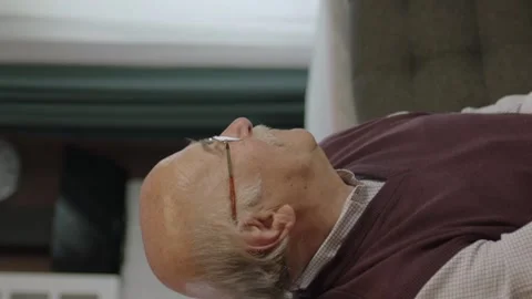 Sad old man with glasses is alone at home. Stock Footage 196111878