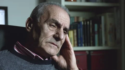 Sad old man sitting alone in his studio Stock Footage 47826283