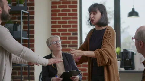 Sad person with anger management issues having breakdown at aa group meeting Stock Footage 165157414