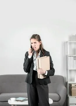 Sad secretary girl, stressed overworked businesswoman too much work, office Stock Photos