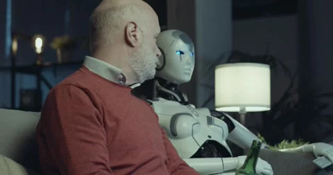 Sad senior man and his AI robot at home Stock Footage 297790837