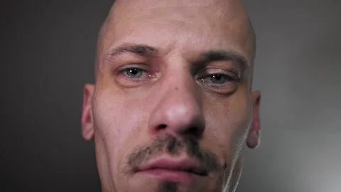 Sad sick man looks at the camera. Stock Footage 225112090