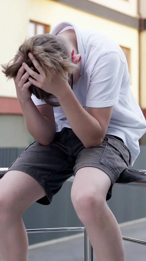 Sad student resting with head down, suffering from depression, school bullying. Stock Footage 328455769