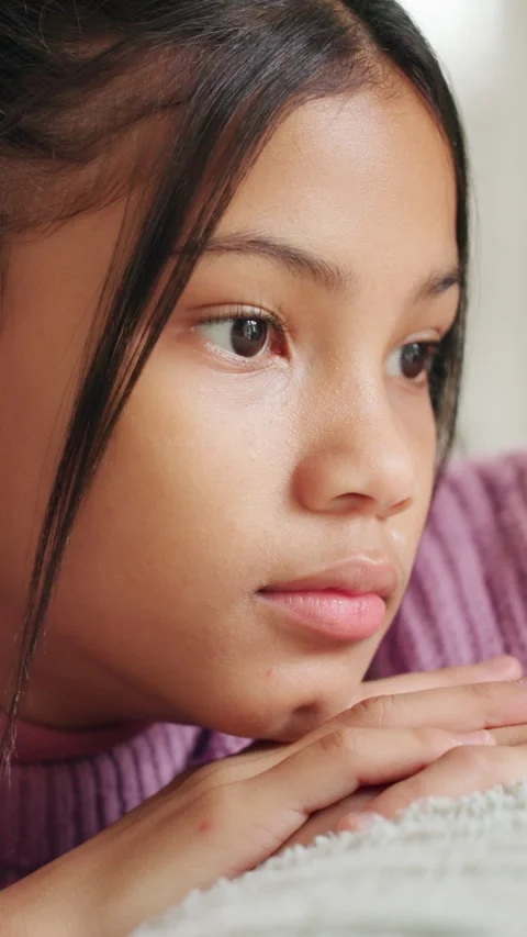 Sad, thinking and child with depression, anxiety and remember memories alone for Stock Footage 333697439