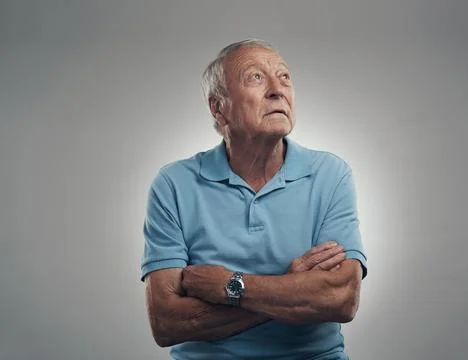 Sad, thinking or old man with arms crossed in studio for memory loss, alzhe.. Stock Photos