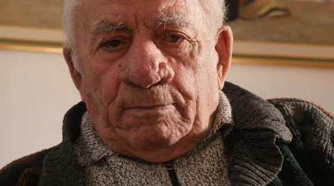 Sad, touched old man's look Stock Footage 63419947
