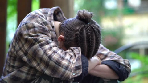 Sad upset boy sitting with his head bowed Vídeo Stock 202042947