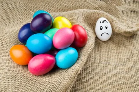 Sad white egg Stock Photos