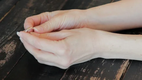 Sad Wife Looking Wedding Ring After Divorce and Leave It Stock Footage 129294098