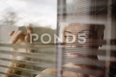 Sad woman blinds Stock Photos