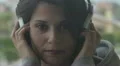 sad woman listening to music HD Footage