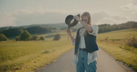 Sad Woman Removing Hat While Standing On Road Stock Footage 251992136