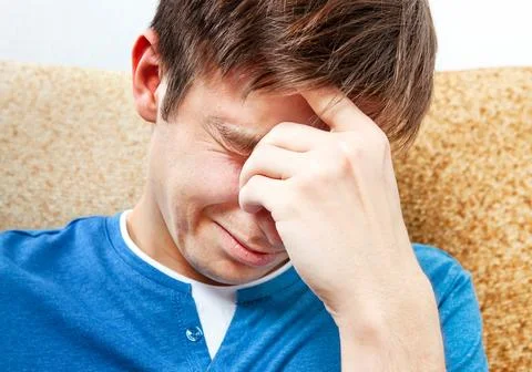 Sad Young Man Crying Foto stock