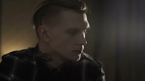 Sad young man drinking wine 動画素材 61445927