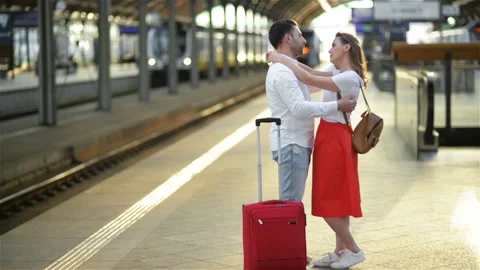 Sad Young Man In Love Caressing And Saying Goodbye To His Girlfriend In Railway Stock Footage 110907955