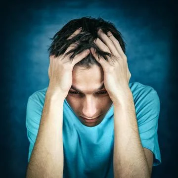 Sad Young Man Stock Photos