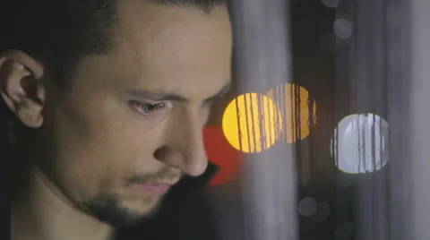 Sadly looking out the window Video stock 58584828