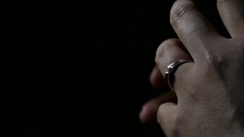 Sadness divorce ring removing from finger. Breakup stop relationship wife Stockbeeldmateriaal 135328422