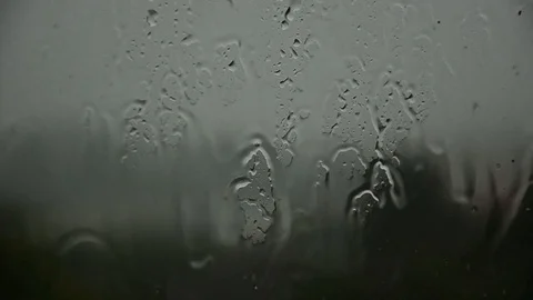 Sadness on a wet window from the rain. Vídeo Stock 97973725