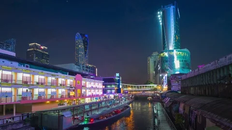 Saen saep canal and boat carrying passengers in downtown Bangkok, Thailand Stock Footage 79446953