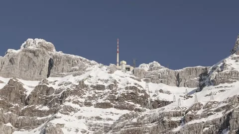 Saentis mountain, blue cloudless sky, with the transmission tower Stock Footage 167888829