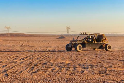 Safari trip through egyptian desert driving buggy cars Stock Photos