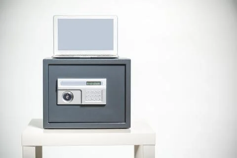 Safe and laptop Stock Photos
