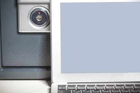 Safe and laptop Stock Photos