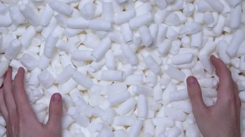 Safe and responsible packaging of goods and parcels in a box with filler. 스톡 동영상 197572673