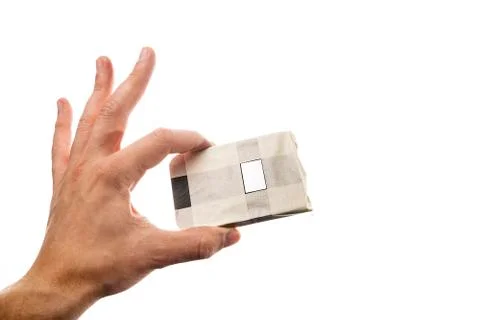 Safe applying liquid metal on CPU crystal in man's hand isolated on white Stock Photos