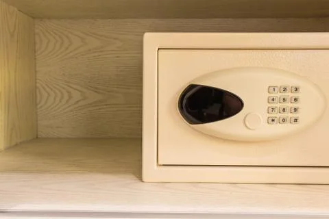 Safe box by number password protected system in room, copyspace background 写真素材