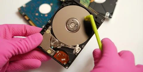 Safe cleaning and verification of your electronic data on media. Concept. Stock Photos