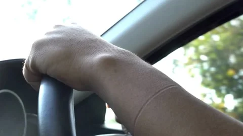 Safe driving concept. Cropped shot of man with his hands on steering wheel in Stock-Footage 336268058