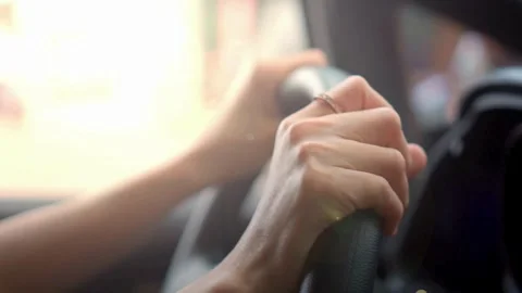 Safe driving concept. Cropped shot of man with his hands on steering wheel in Stock-Footage 336268393