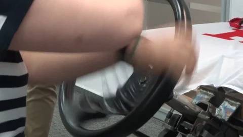 Safe driving school - steering wheel turns with an instructor Stock Footage 94865693