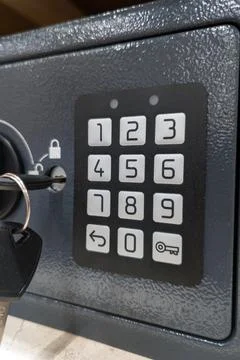 Safe with numeric keypad and key lock for secure storage in a home or office Stock Photos