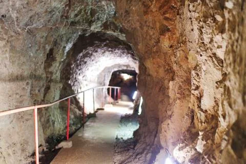 A safe path in a stalactite cave Stock Photos
