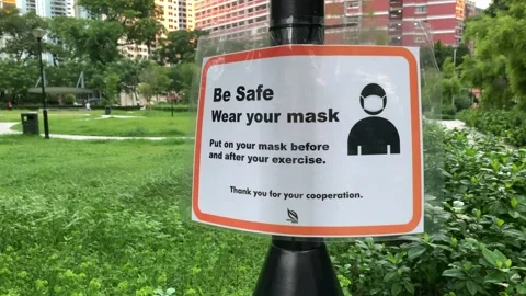 Safe Social Distancing Measures in the Park Video stock 133238486