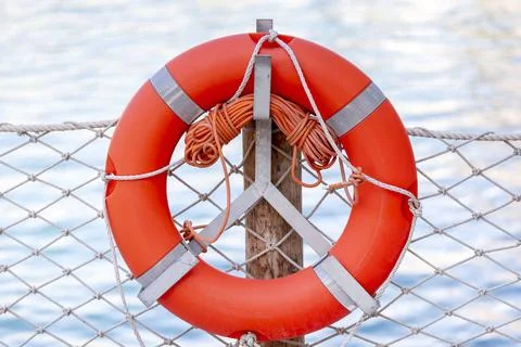 Safeguard ring at the beach. Device helping to float on water. Rescue assi... Foto stock