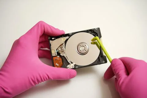 Safely clear and validate your electronic data on the media. Concept. Hands in Stock Photos